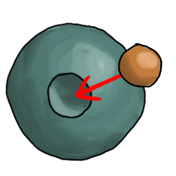 a clay ball with an indent, and a smaller ball being pointed at the socket with an arrow