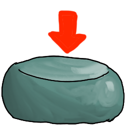 a clay ball, mashed a bit flat, with an arrow