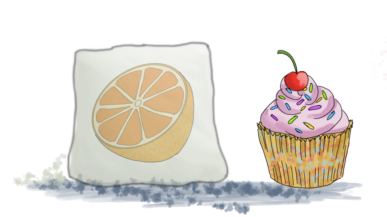 the orange has been consumed, the cube now a formidable size, all things considered. A cupcake has appeared to the right.