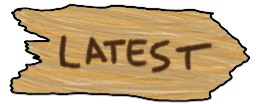 "LATEST", printed on a long wooden sign board pointing to the rightt.